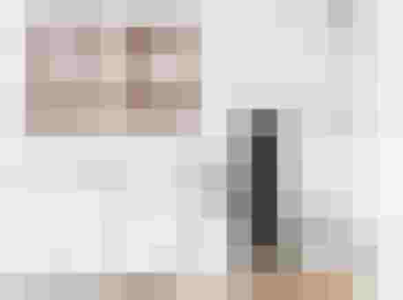 Modernes Schlafzimmer mit Designheizkörper, natürlichem Raumklima und energieeffizienter Technik